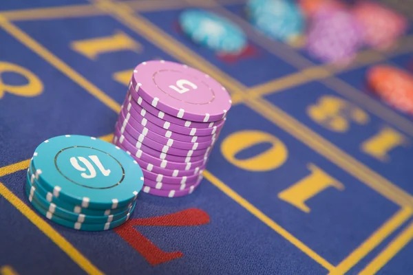 Slot game interface showing reels, paytable, and spin controls